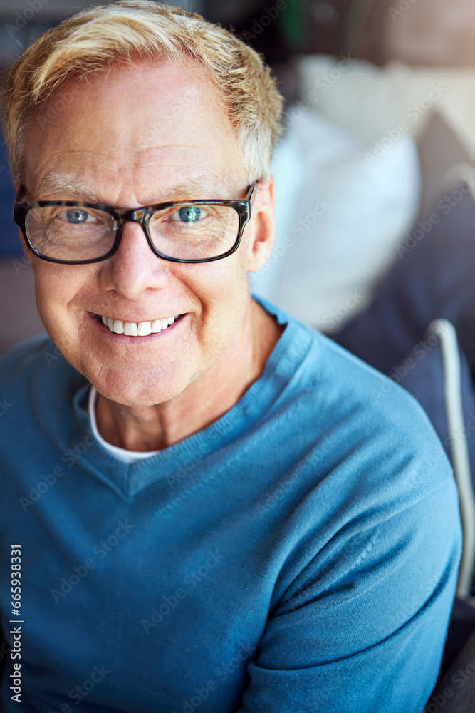 Portrait, mature or happy man in house with glasses on living room sofa for calm and relax. Apartment, face or senior person with smile, peace or wellness in home for a resting break in retirement Portrait, mature or happy man in house with glasses on living room sofa for calm and relax. Apartment, face or senior person with smile, peace or wellness in home for a resting break in retirement