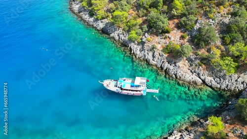 Amazing aerial view of mediterranean bay with boat.  photo