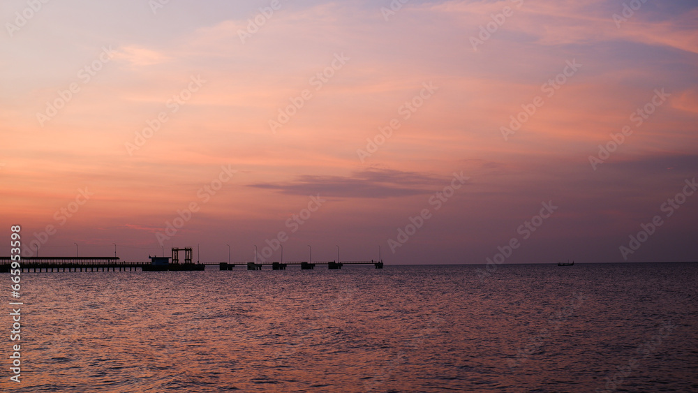 View of the sky at dusk and the sun is about to set. View of the sky at dusk and the sun is about to set.