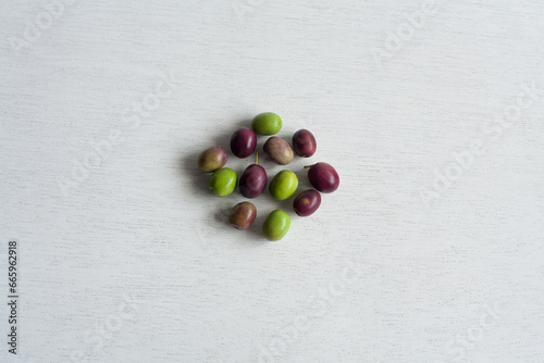 Fresh Olives, Green and Purple Fruits, isolated on white background