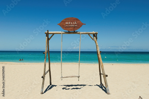 Varadero ,CUBA - APRIL 08, 2023 : The beach of Varadero in Cuba on a beautiful summer morning photo