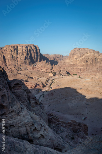 Scenic view of Colonnaded Street, Great Temple and Qasr al-Bint in the historic and archaeological city of Petra, Jordan from above