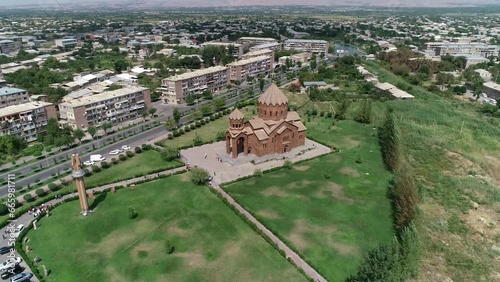Aerial footage of Surp Hovhannes Church (St. John Church) on a sunny day in Artashat town, Armenia photo