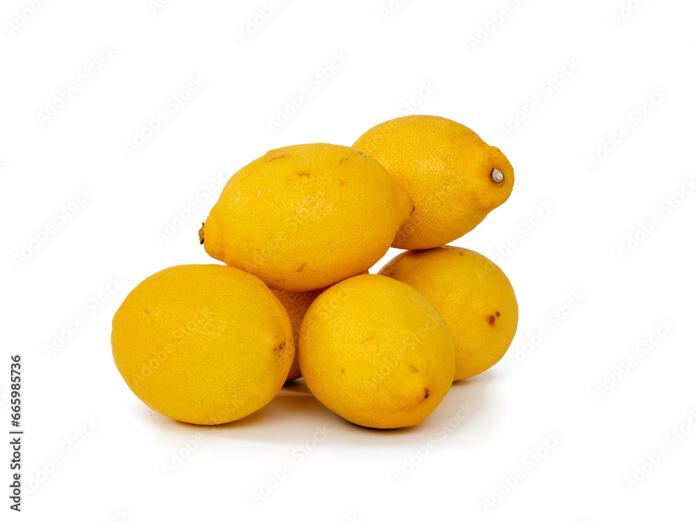 Fresh lemons on a white background. Lemon fruit close-up. Fresh lemons on a white background. Lemon fruit close-up.