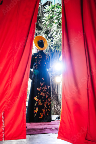 Artists performing Vietnamese classical opera make up for the show in Binh Thanh District