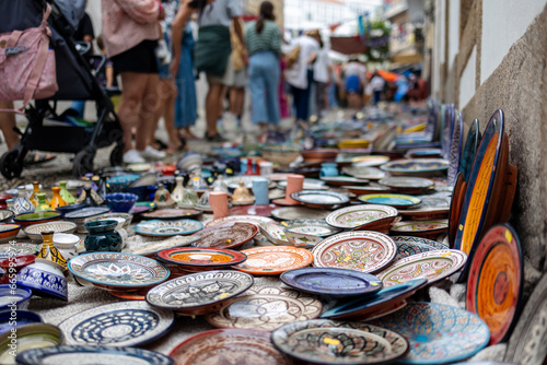 Artistry on Display: Handcrafted Ceramic Plates at the Street Market
