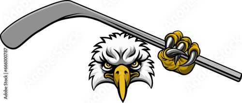 An eagle ice hockey player animal sports mascot holding a hockey stick
