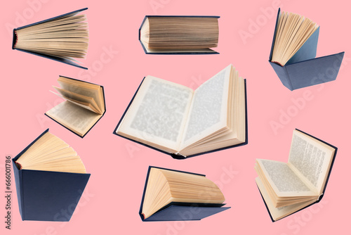 collection of various books isolated on pink background. each one is shot separately.