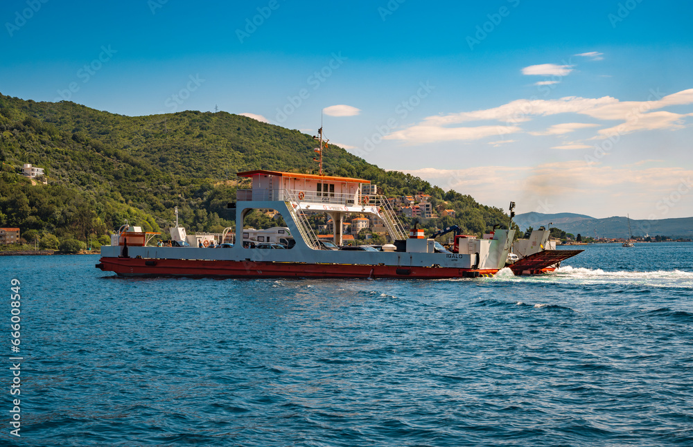 Tivat, Montenegro - September 6 2023: ferry with cars and tourists between Lepetane-Kamenari