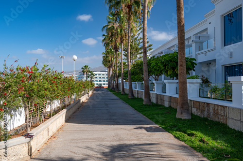 A footpath, next to a row of holiday apartments, in Tenerife, Spain. Tenerife is a popular tourist desitination in the Atlantic ocean.