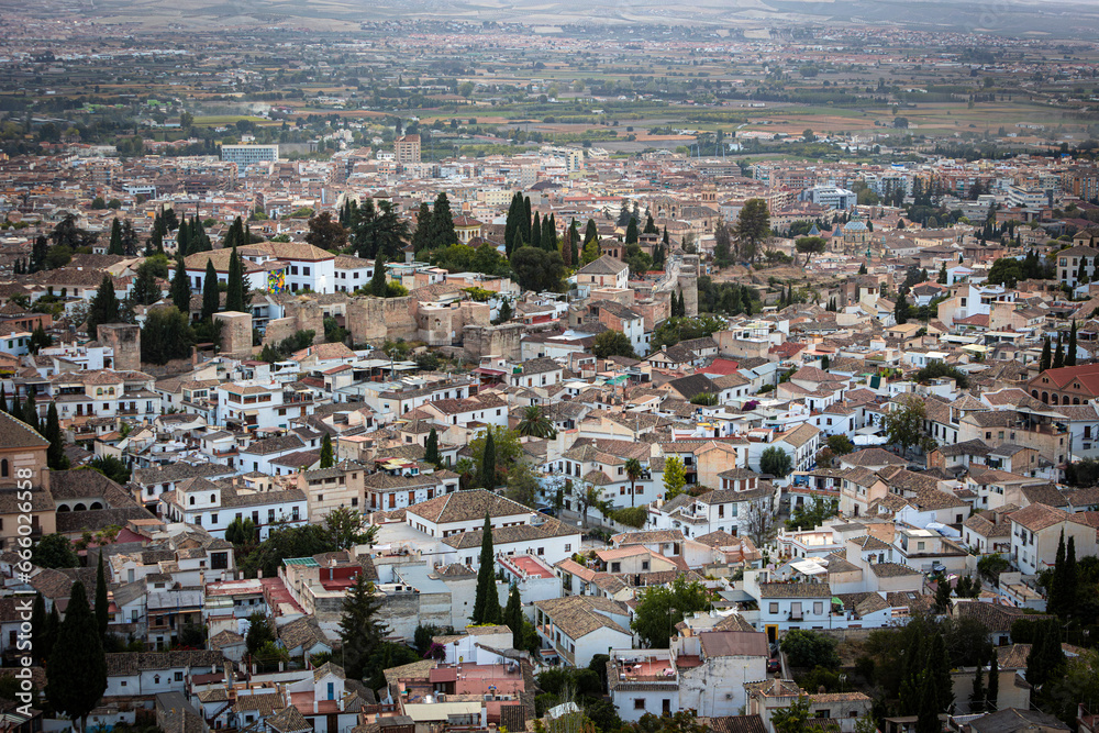 General view of the famous Albaicin neighborhood from San Miguel Alto balcony in Granada, Andalusia, Spain. The Albaicin is a UNESCO World Heritage Site.