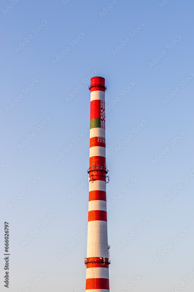 Concept shot of the chimney of thermal power plant. Industrial Concept shot of the chimney of thermal power plant. Industrial