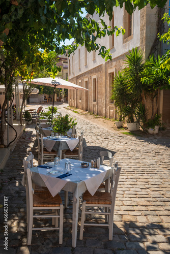 Restaurant tables in Chania on Crete, Greece © Mateusz