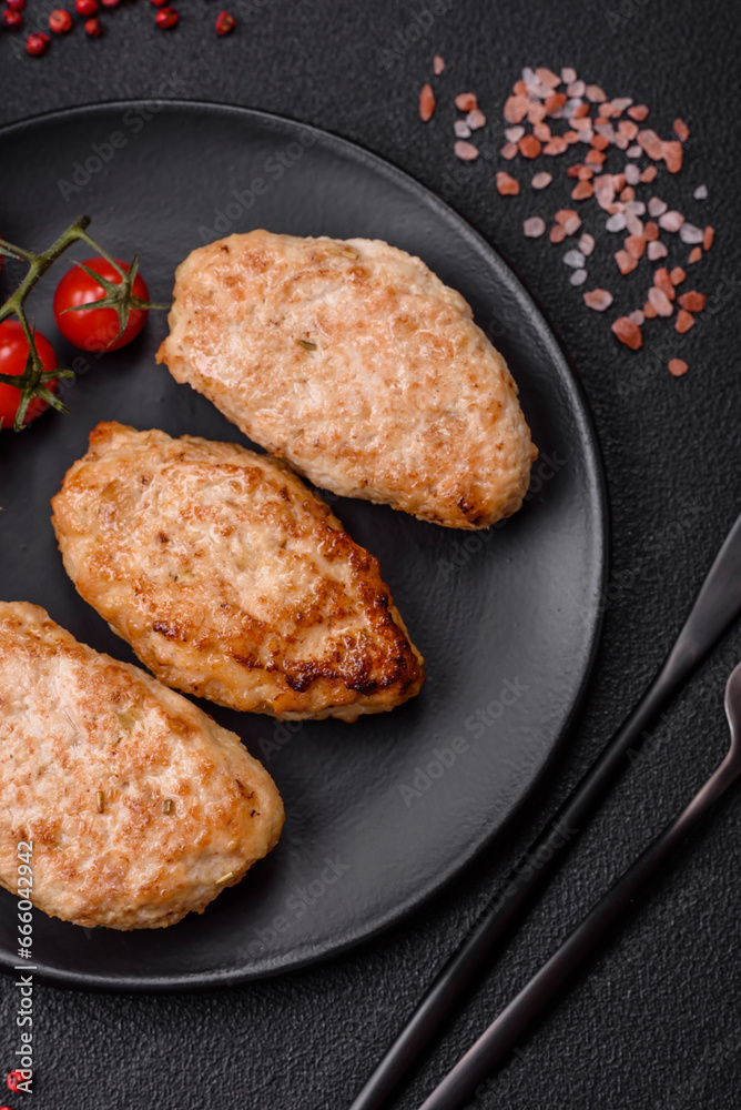 Delicious fresh chicken cutlets or meatballs with salt, spices and herbs