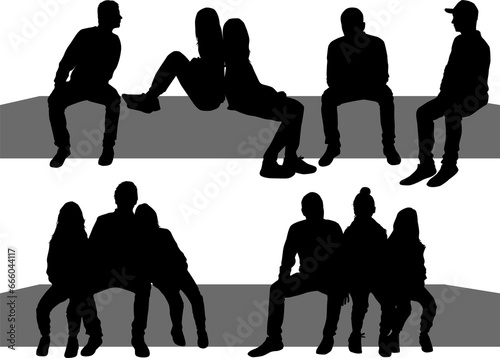 Black silhouettes of a people sitting	
