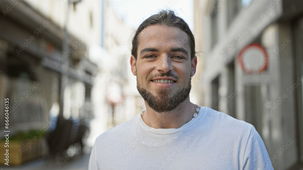 Young hispanic man smiling confident standing at street Young hispanic man smiling confident standing at street