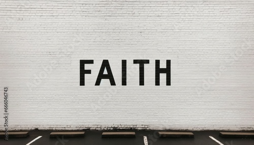 White wall in the street with the word faith in it.