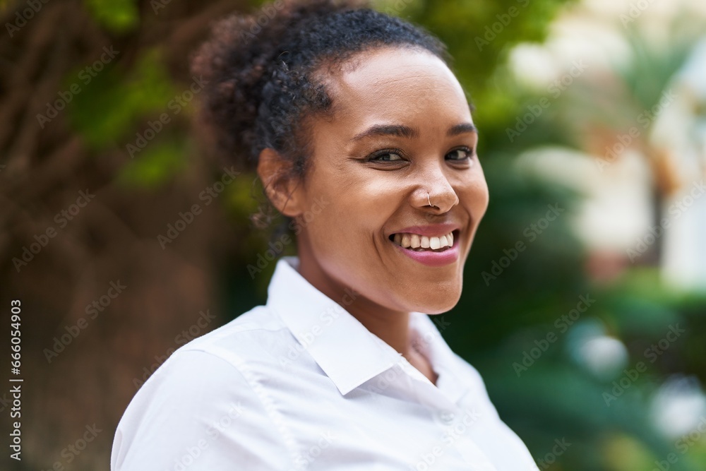 African american woman smiling confident standing at park African american woman smiling confident standing at park