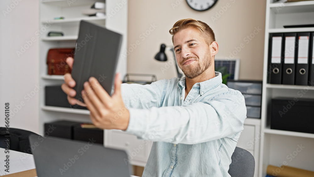 Young caucasian man business worker make selfie by touchpad at office