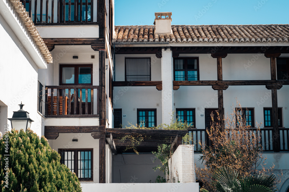 OLD RESIDENTIAL BUILDING WITH TERRACES AND TREES