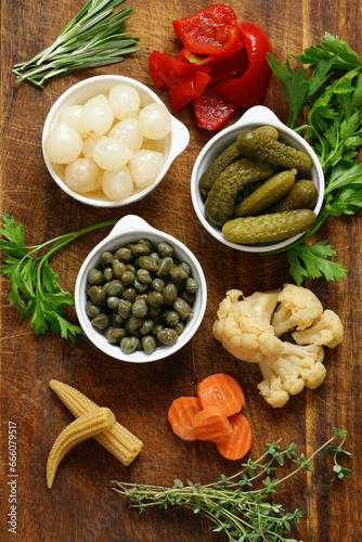 Fototapeta Naklejka Na Ścianę i Meble -  pickled vegetables - cucumbers, onions, corn