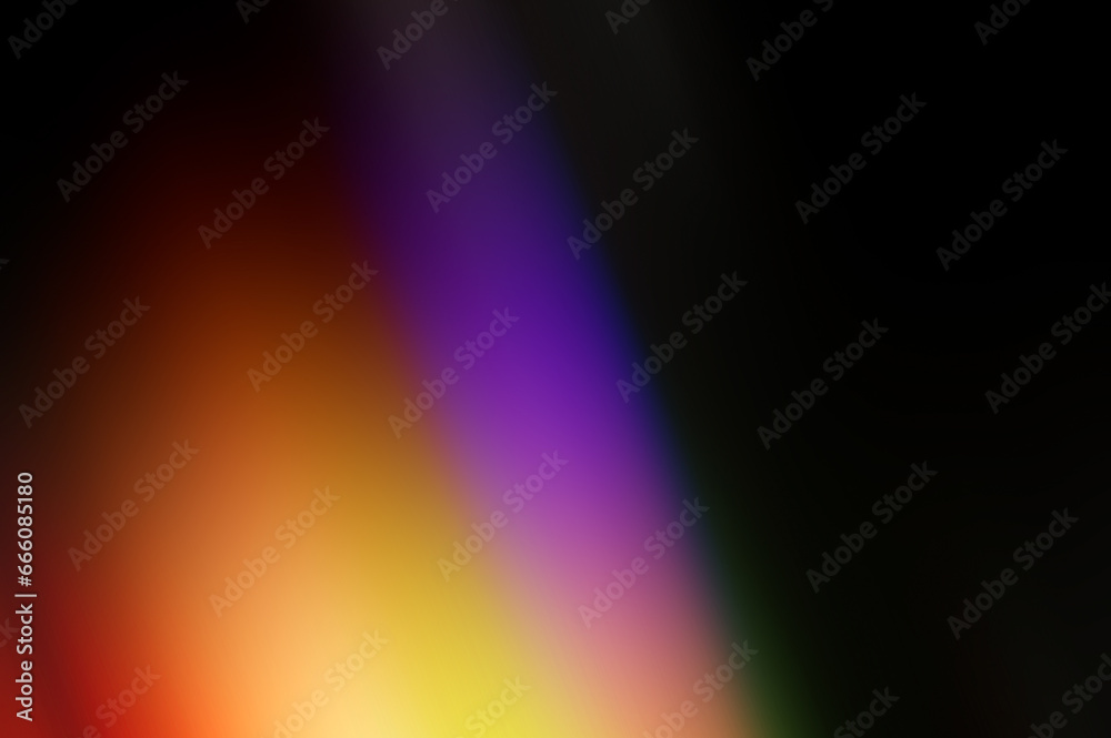 Abstract blurred background, orange and purple on black.