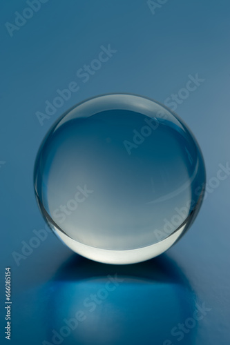 Crystal magic ball in blue, close -up.