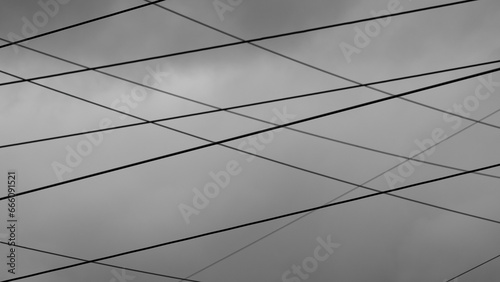 metal wires against a gray sky background