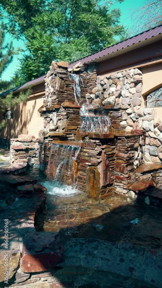 Clear water flows from the waterfall