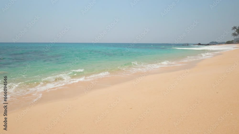 Sunlit Serenity: Waves Gently Caressing the Shoreline of a Sandy Beach
Sunlit Serenity: Waves Gently Caressing the Shoreline of a Sandy Beach