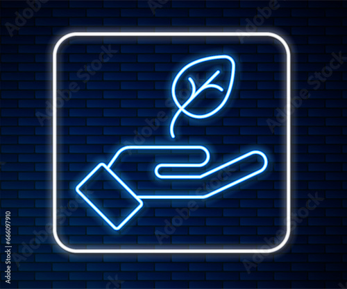 Glowing neon line Plant in hand of environmental protection icon isolated Glowing neon line background. Seed and seedling. Planting sapling. Ecology concept. Vector