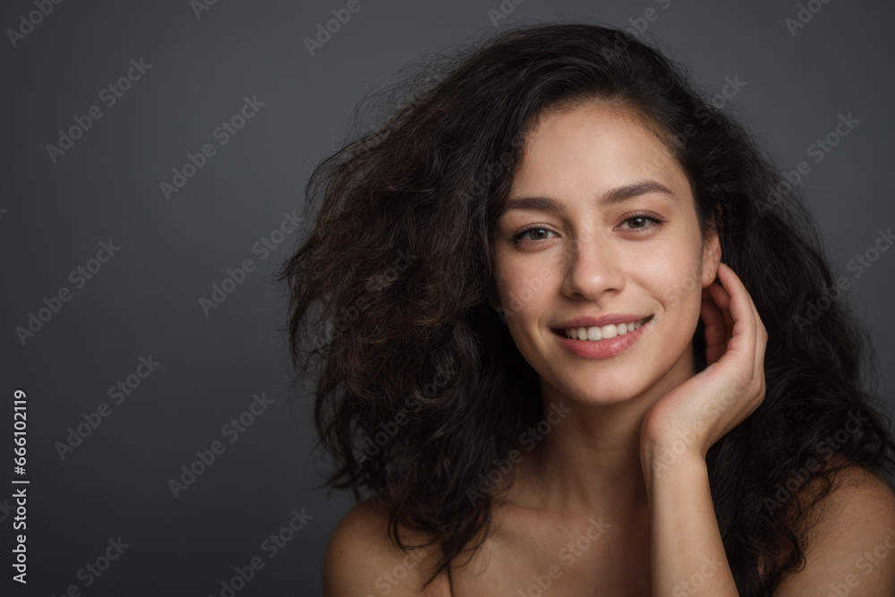 Everyday people. A smiling woman. Brown frizzy hair to her shoulders