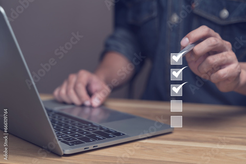 Checklist survey customer research education. Man checkbox virtual form questionnaire document report with laptop. Results satisfaction assessment of business service users. Digital question screen