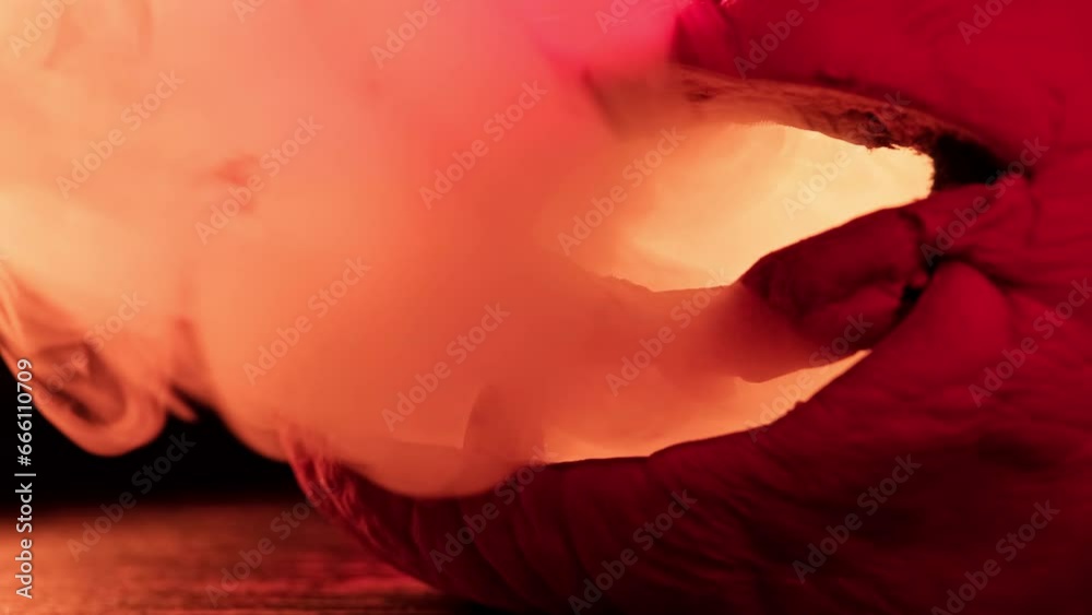 Spooky Halloween jack o lantern with glowing scary face in smoke. Smoke appearing from eyes of pumpkin. Color of light changes. Close-up of aged pumpkin with wrinkles and glowing eyes. 4K, UHD Spooky Halloween jack o lantern with glowing scary face in smoke. Smoke appearing from eyes of pumpkin. Color of light changes. Close-up of aged pumpkin with wrinkles and glowing eyes. 4K, UHD