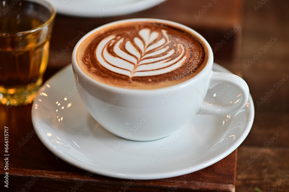 high angle view of coffee cup on wood grain table Drinking Concept: Hot Coffee, Latte, Espresso, Cappuccino
