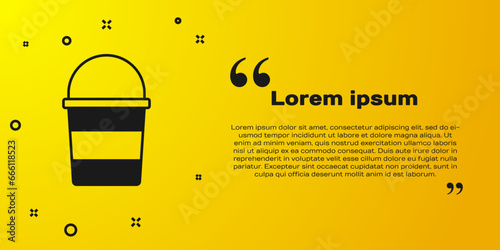 Black Fire bucket icon isolated on yellow background. Metal bucket empty or with water for fire fighting. Vector