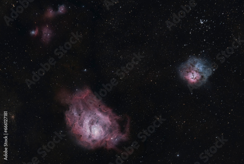 Lagoon Nebula (M8) & Trifid Nebula (NGC 6514) are large interstellar gas regions in the constellation Sagittarius