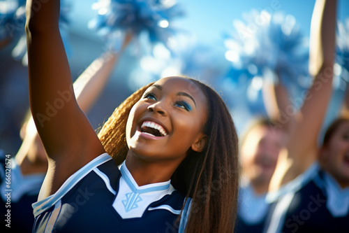 Blue uniformed cheerleaders, adding excitement to the stadium