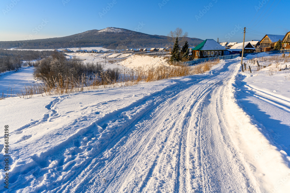 Winter snowy village in the Ural mountains.