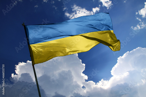 national flag of Ukraine waving in the wind on a clear day.