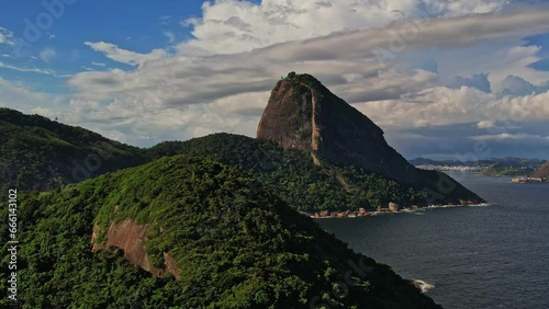 Drone footage of Pao de a�ucar in Rio de Janeiro Brazil. Pan movement to see the bay and the landscape around this natural monument. photo