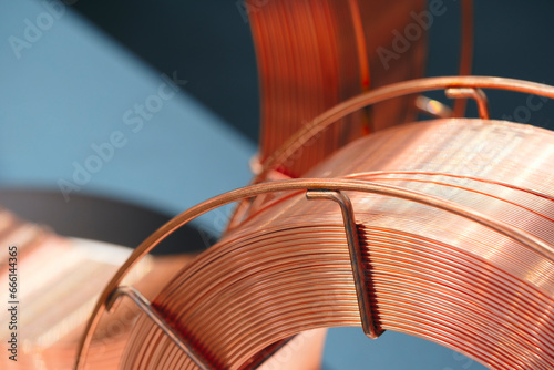 Coil of copper wire for welding tools and other industrial applications © Aleksandr Matveev