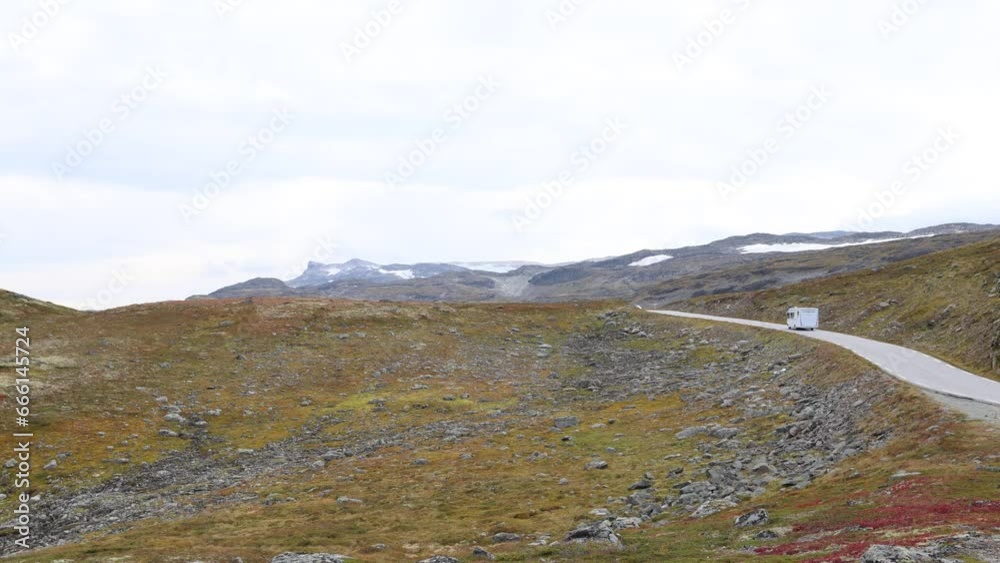 A scene on a rainy day and motorhome on the dangerous and scenic Road, Norway