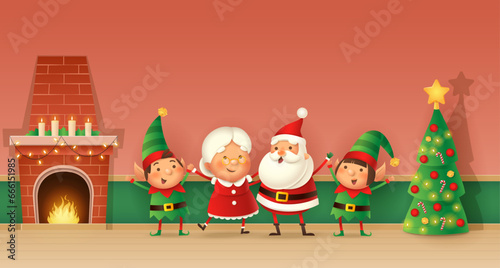 Christmas card - Santa Claus, Mrs Claus and Elves celebrate Christmas - home interior with fireplace and tree