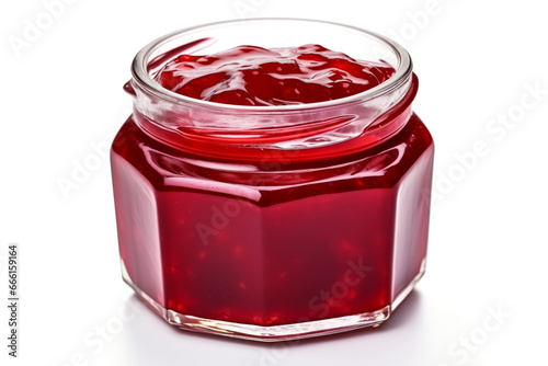 Open jar of jam isolated on a white background.