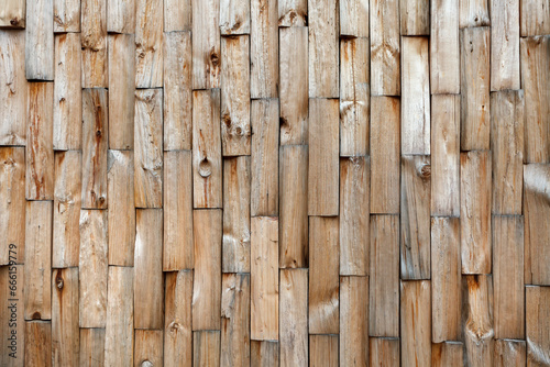 The surface is made of chopped wooden bars of natural color.