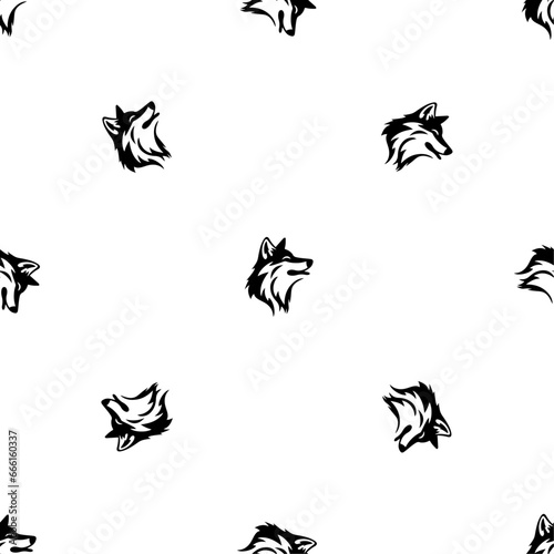 Seamless pattern of repeated black wolf heads. Elements are evenly spaced and some are rotated. Vector illustration on white background