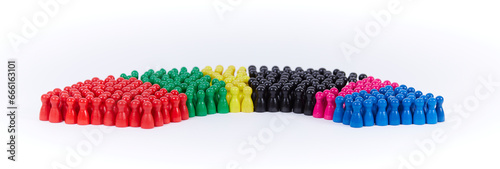 wooden figurines in the colors of German political parties and the rotunda of the german parliament photo