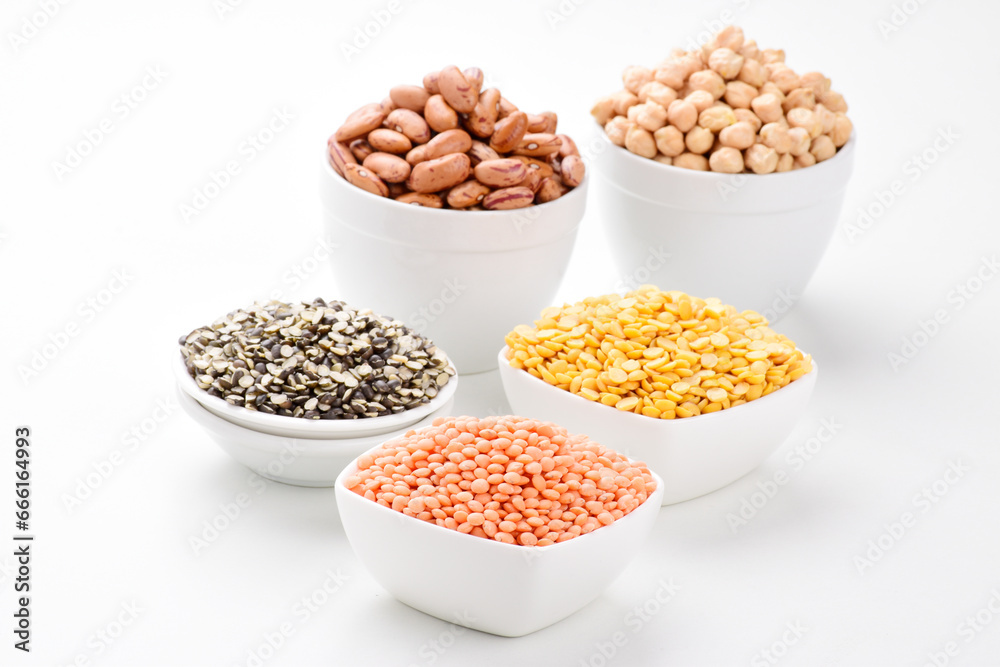 Uncooked red lentils with kidney beans and chana dal isolated on white background Uncooked red lentils with kidney beans and chana dal isolated on white background