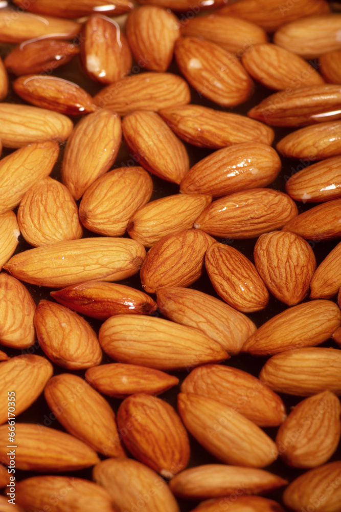 Wet almond texture background healthy food Wet almond texture background healthy food